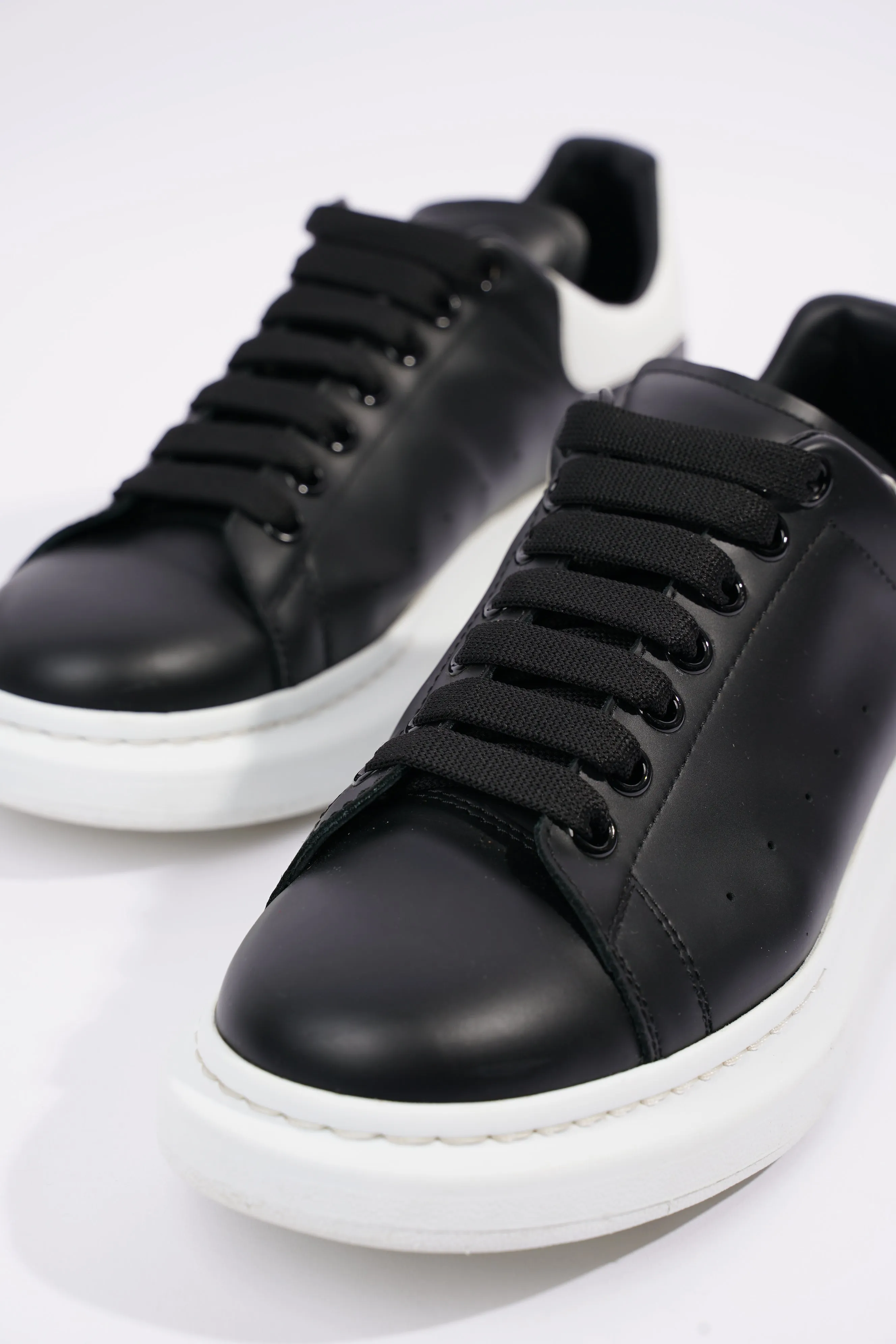 Alexander McQueen Mens Oversized Sneaker Black Leather / White Tab EU 42 / UK 8