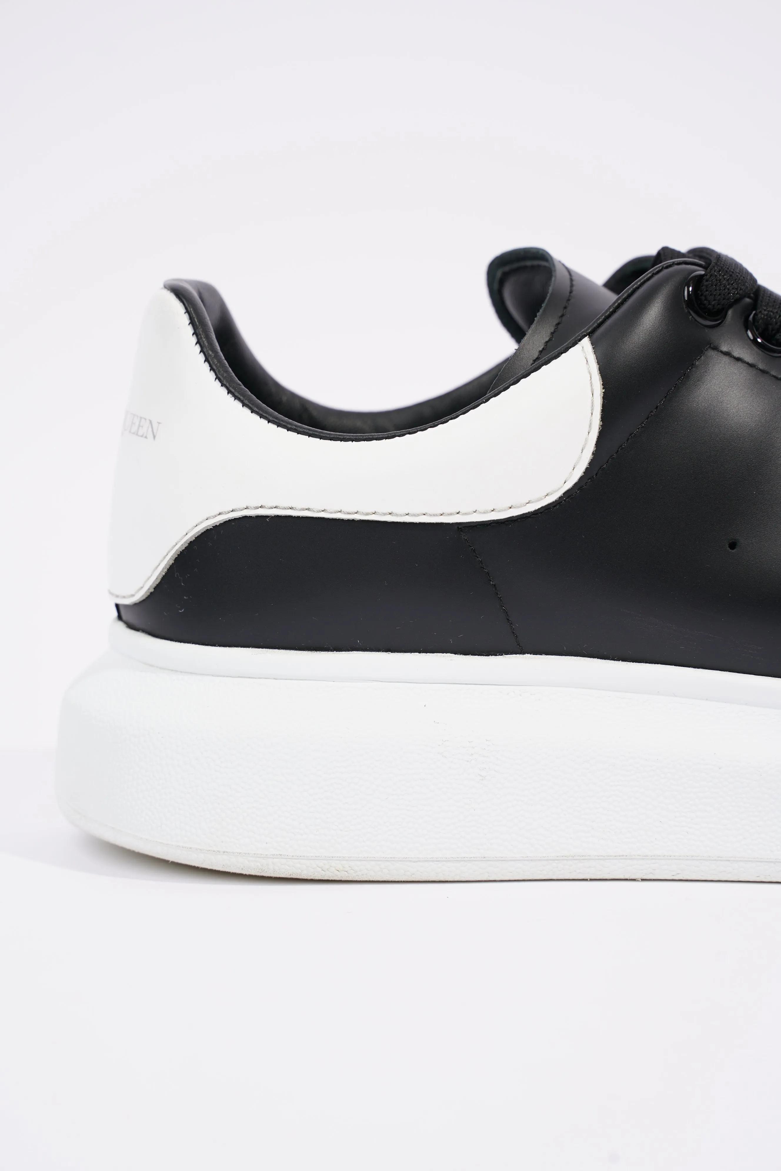 Alexander McQueen Mens Oversized Sneaker Black Leather / White Tab EU 42 / UK 8