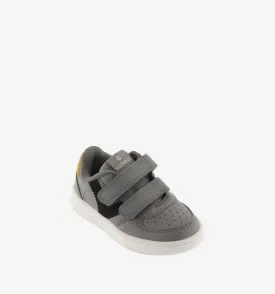 Gray leather sneaker with contrast black V