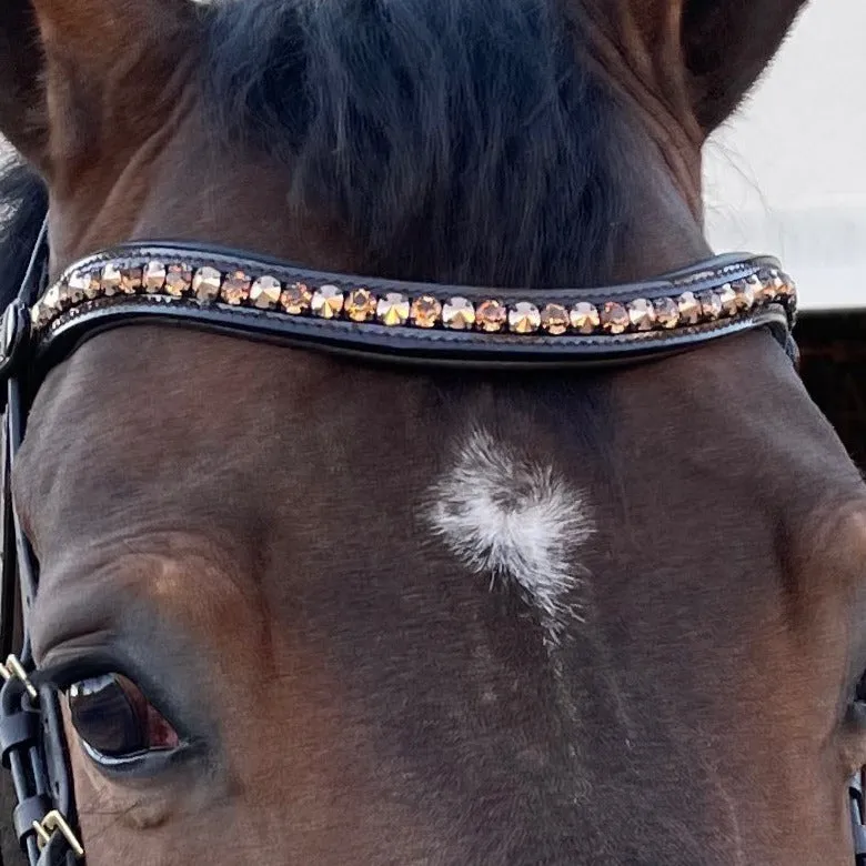 The Vienna Brown Patent Leather Snaffle Bridle with Bronze Golden Sparkle Piping